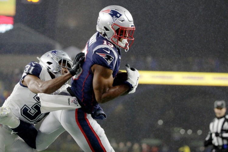 Patriots wide receiver N'Keal Harry, right, caught the first touchdown pass of his career on Sunday in New England's 13-9 win over Dallas.