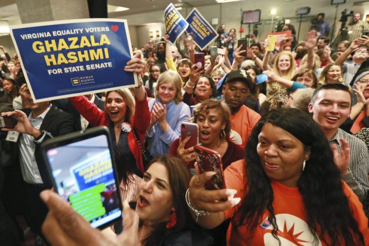 Democratic supporters cheer at their party in Richmond, Va., on Tuesday. All seats in the Virginia House of Delegates and state Senate were up for election. 