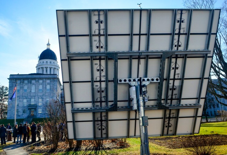 AUGUSTA, ME - NOVEMBER 26: The Maine State House is seen in background of this photo taken on Tuesday November 26, 2019 showing new tracking solar panel array on the grounds of The Blaine House in Augusta. (Staff photo by Joe Phelan/Staff Photographer)