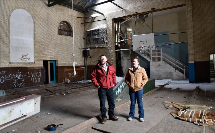 Uria  and Angela Pelletier of Kavestone LLC discuss renovations to the former Boys & Girls Club in Waterville on March 14, 2018. Uria Pelletier and the First Congregational United Church of Christ are seeking a zoning change so that the church can occupy a section of the building.