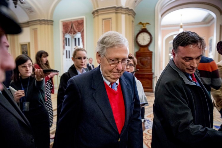 Senate Majority Leader Mitch McConnell of Ky., walks to the Senate Chamber, Monday, Dec. 16, 2019, on Capitol Hill in Washington. (AP Photo/Andrew Harnik)