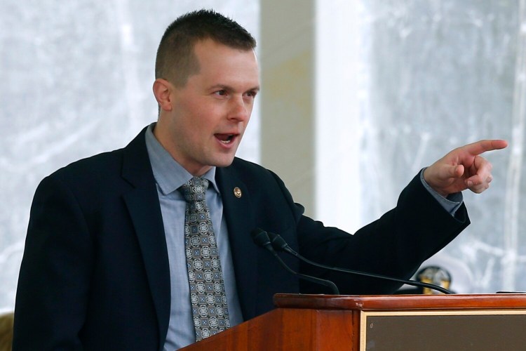 U.S. Rep. Jared Golden speaking in Maine last spring.