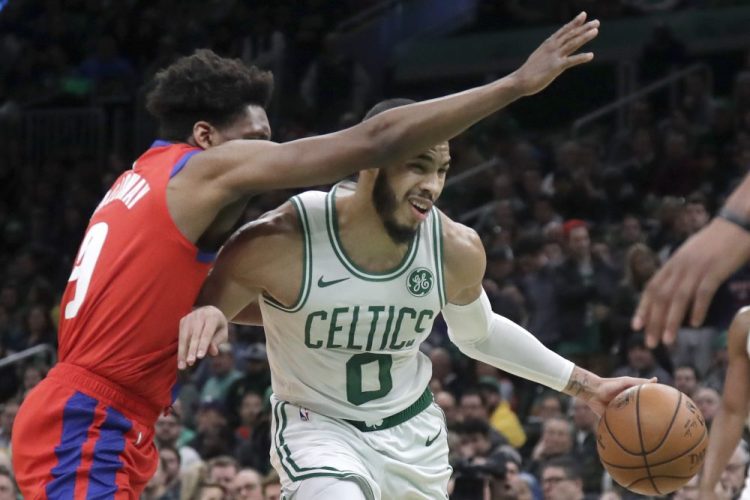 Celtics forward Jayson Tatum drives against Pistons guard Langston Galloway during the Celtics' 114-93 win Friday in Boston.