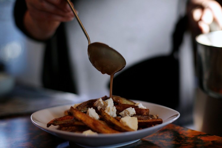 Columnist Christine Burns Rudalevige makes Sammy's Poutine. Hey, we all need to do our bit to help dairy farmers. 