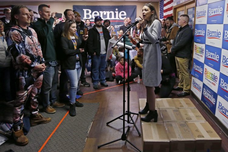 Rep. Alexandria Ocasio-Cortez, D-N.Y., speaks as a surrogate of Democratic presidential candidate Bernie Sanders on Saturday in Cedar Rapids, Iowa. 