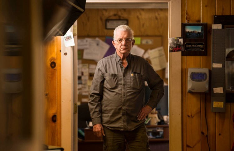 Tom McCarthy poses Thursday for a portrait at his place of business, McCarthy Enterprises on North Avenue in Skowhegan.