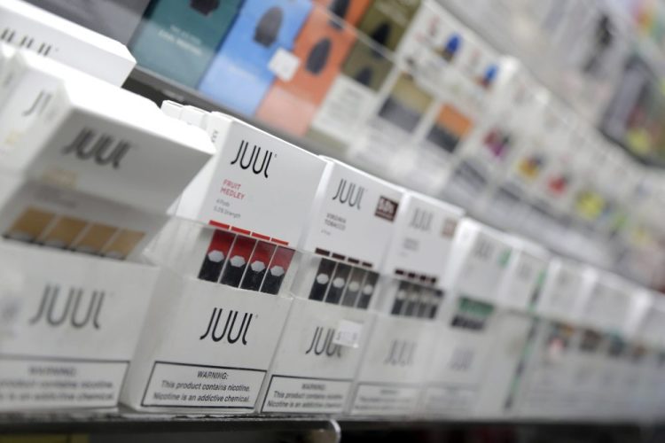 Juul products at a smoke shop in New York. Juul has stopped TV, print and digital advertising and eliminated most flavors in response to concerns by government officials and others. 