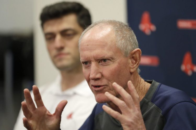 Ron Roenicke, interim Red Sox manager, says he's adjusting to his new role. Chief Baseball Officer Chaim Bloom is at left.  