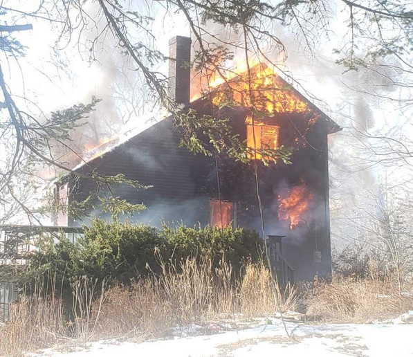 The fire was spotted by people passing by the house at 6 Heron Cove, off Waterman's Beach Road near the intersection with Route 73 in South Thomaston.
