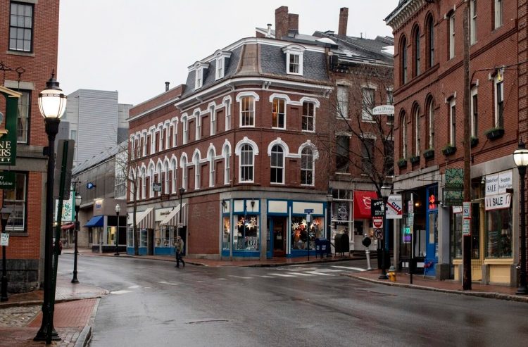 Fore Street, in the heart of Portland's Old Port, was nearly empty on St. Patrick's Day, after the city announced a curfew for businesses. Only take-out or pickup was allowed at restaurants.