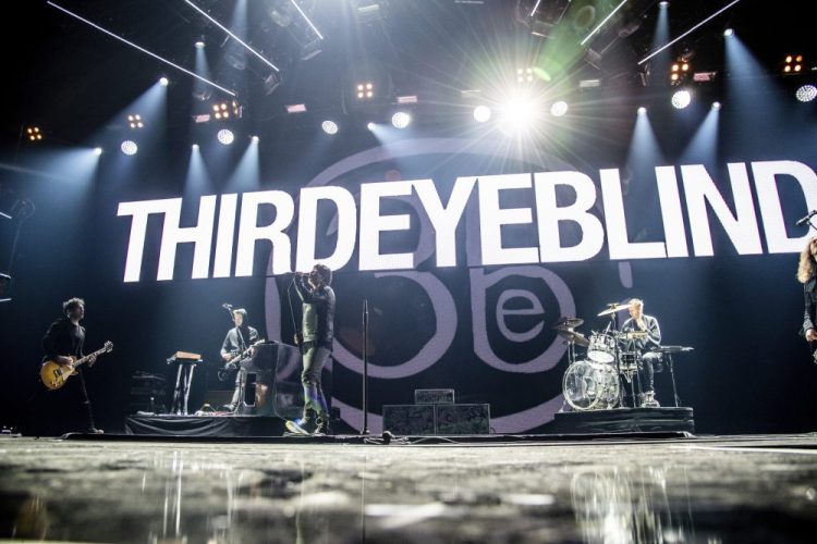 This Dec. 8, 2018 file photo shows Kryz Reid, from left, Alex Kopp, Stephan Jenkins and Brad Hargreaves of Third Eye Blind performing at the 2018 KROQ Absolut Almost Acoustic Christmas in Inglewood, Calif. 