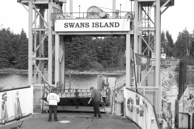A ferry departs the Swan’s Island ferry terminal. As of Monday morning, the Maine State Ferry Service had not adjusted its schedule but had taken other precautions in response to the coronavirus.