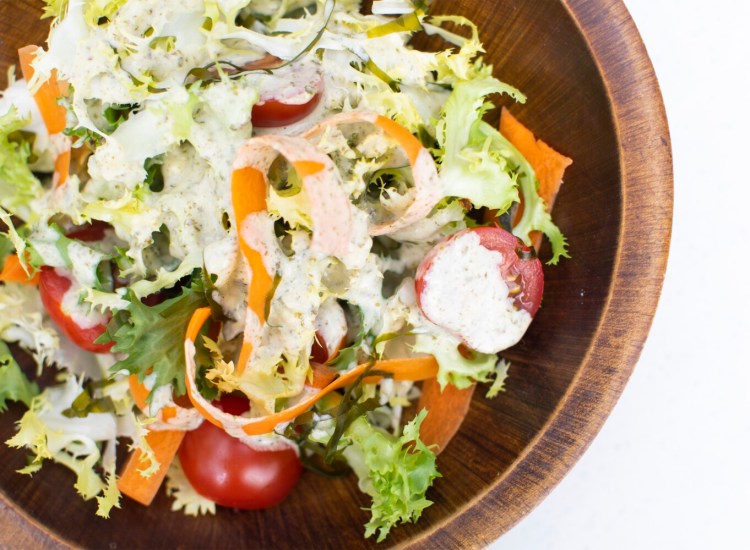 Winter greens salad with Maine Seaweed and Tahini Dressing.