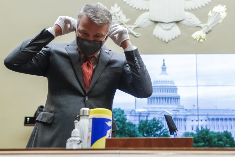 Dr. Richard Bright, former director of the Biomedical Advanced Research and Development Authority, arrives for a House Energy and Commerce Subcommittee on Health hearing to discuss protecting scientific integrity in response to the coronavirus outbreak, Thursday, May 14 on Capitol Hill.