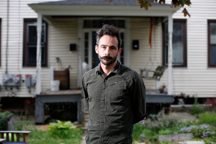 Christian MilNeil was summsoned by police Tuesday morning on a charge of criminal mischief. MilNeil denies the charge and believes he is being harassed for his Twitter posts. 