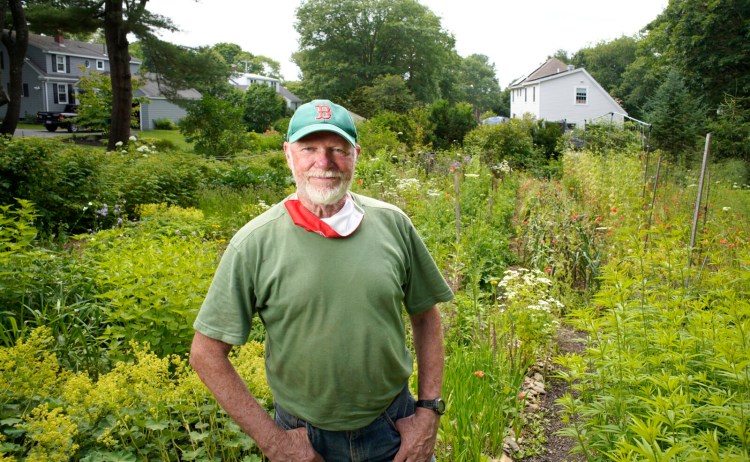 In his own corner of the world, columnist Tom Atwell, shown here outside his Cape Elizabeth home, can work to combat climate change by steps like avoiding leaf blowers and switching from gas to electric for lawn equipment. So can you. 