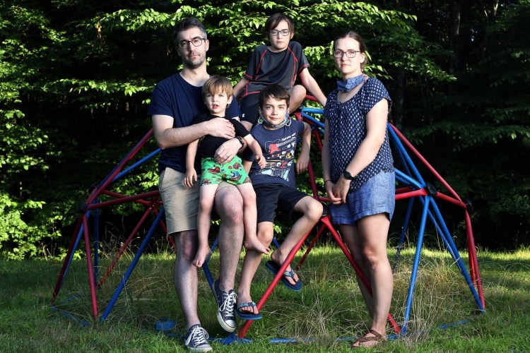 The Trombley family at their home in Windham are clockwise from top left: Michael; Julian, 10; Maire; Clemmie, 8; and Arthur, 3. Maire, a fourth-grade teacher in Scarborough, is concerned that teachers aren't being given much choice about returning to school. Her husband is also worried about students returning in-person. 