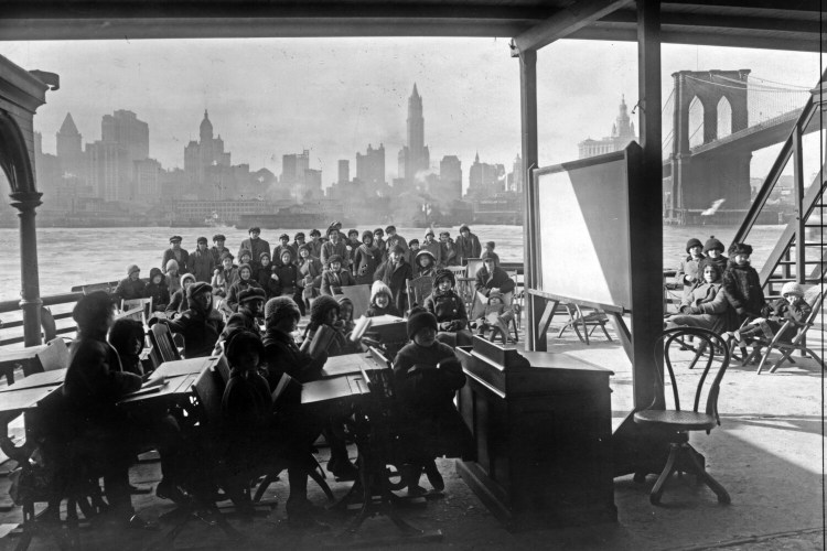 This 1911 photo from the Library of Congress shows schoolchildren on the ferry boat Rutherford, across the river from Manhattan, and near the Brooklyn Bridge, at right, in New York. Outdoor education was an early-20th century response to outbreaks of infectious diseases such as tuberculosis.