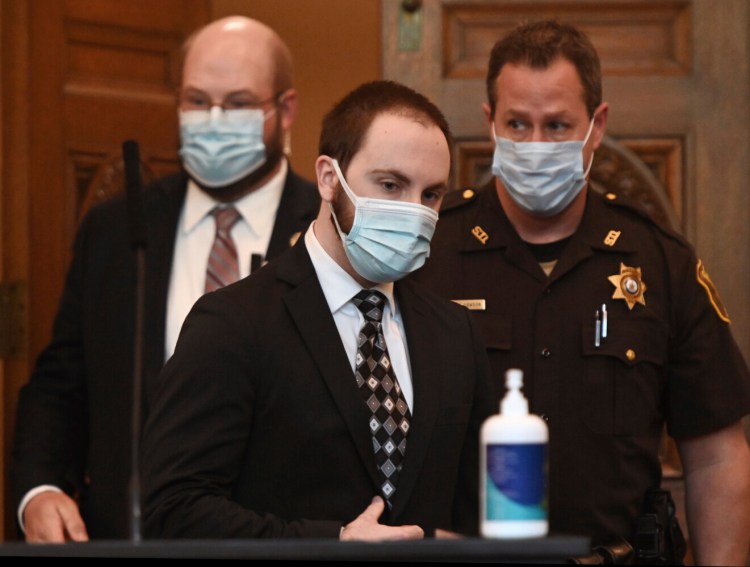 Mark Cardilli Jr. enters the Cumberland County Courthouse for his sentencing Monday, Aug. 31, 2020, in Portland, Maine. Cardilli Jr. admitted shooting 22-year-old Isahak Muse during a family fight. (Shawn Patrick Ouellette/Portland Press Herald via AP, Pool)