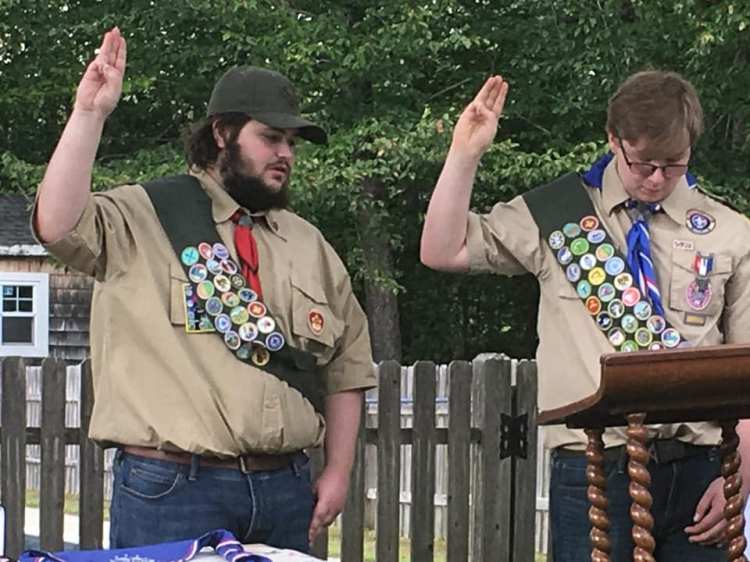 Aidan Shannon, left, and Max Hill, as Hill reads the Call of the Eagle.