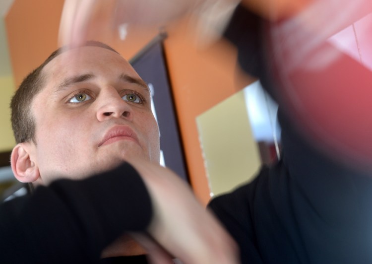 Justin Rolfe works out in his Fairfield home back in February 2015. Rolfe will fight Tracey Johnson for the vacant USA New England Heavyweight title on August 29 in Derry, New Hampshire.