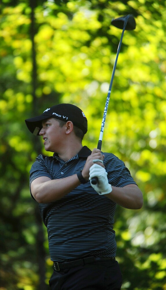 11250# 01somerset PITTSFIELD, MAINE SEPTEMBER 21 2020,  MCI's Owen Moore follows his tee shot during high school golf action at the JW Parks Golf Course in Pittsfield, Maine Monday September 21, 2020.(Staff photo by Rich Abrahamson/Morning Sentinel)