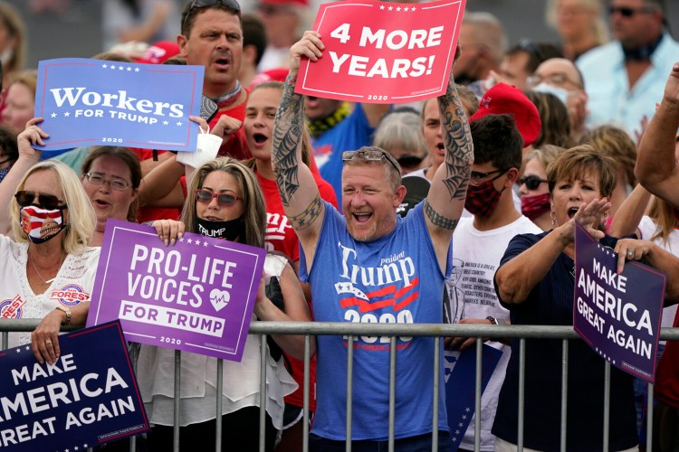 People arrive before a campaign rally with President Trump on Tuesday in Winston-Salem, N.C. 

