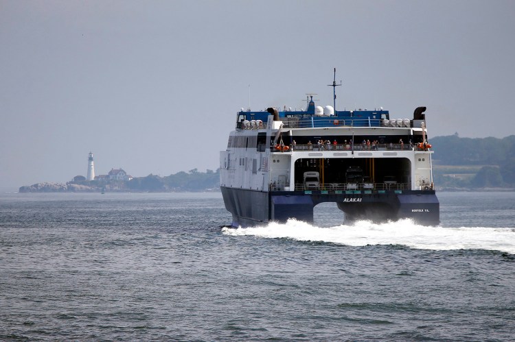 The CAT Ferry heads toward Portland Head Light on its way out of Casco Bay toward Yarmouth, Nova Scotia on July 17, 2017.