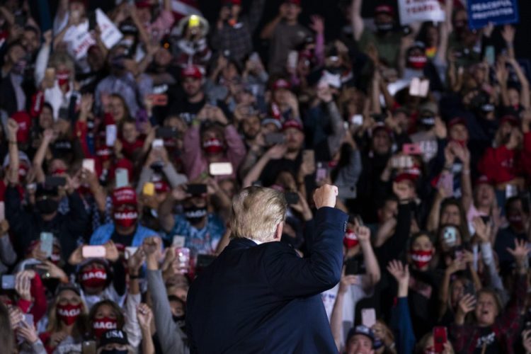 President Trump arrives to speak to a campaign rally at Middle Georgia Regional Airport on Frida, in Macon, Ga. He scheduled events in Muskegon, Mich., and Janesville, Wis., on Saturday.

