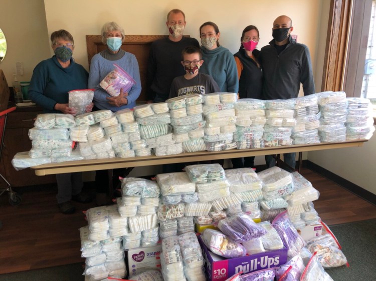 St. Mark's Episcopal Church in Waterville held its annual diaper drive Oct. 18. Helping with the diaper driver from left were Dawn Cates, 
Joan Sanzenbacher, 
Jonathan Knock, 
Caleb Knock, 
Melinda Corey, 
Allison Meyers and
Robert Hernandez.