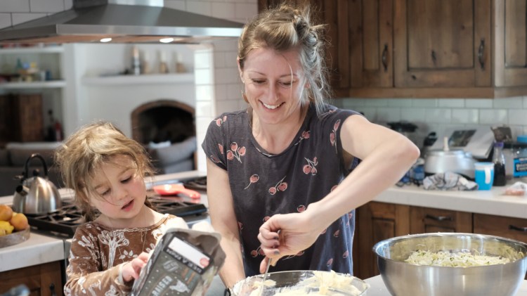 Lasagna Love founder Rhiannon Menn often cooks with her 3-year-old daughter, Cimorene, in their San Diego home. 