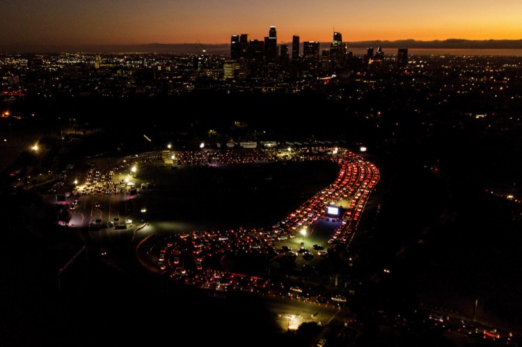 Motorists wait in long lines for a COVID-19 on Nov. 18 test in a parking lot at Dodger Stadium in Los Angeles. Health experts around the country are hoping the incoming Biden administration will put in place a comprehensive national testing strategy. 