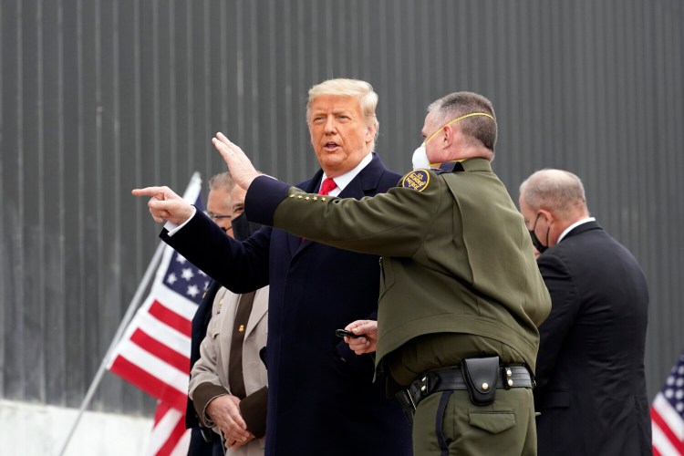 President Trump tours a section of the U.S.-Mexico border wall under construction on Tuesday in Alamo, Texas. 