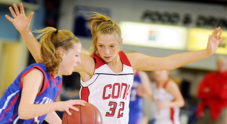 Staff photo by Andy Molloy
RAMS: Cony High School's Mia Diplock 1 defends during a tournament match up Augusta.