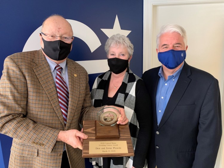 John Fortier, left, of Belgrade, past recipient of the award, presents the 2020 Central Maine Scouting Citizen Award to Irene and Don Plourde of Sidney. Pine Tree Council serves more than 6,000 youth and adult families in western, central and southern Maine.