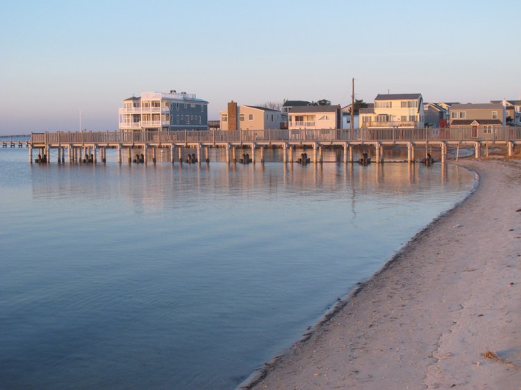 Homes line the edge of Manahawkin Bay on Sunday in Long Beach Township, N.J. An official with the U.S. Army Corps of Engineers said Monday that a years-long study of how to reduce or prevent flooding along New Jersey's back bays will include recommendations for storm surge barriers, flood walls, elevating homes and other measures when it is released in July.
