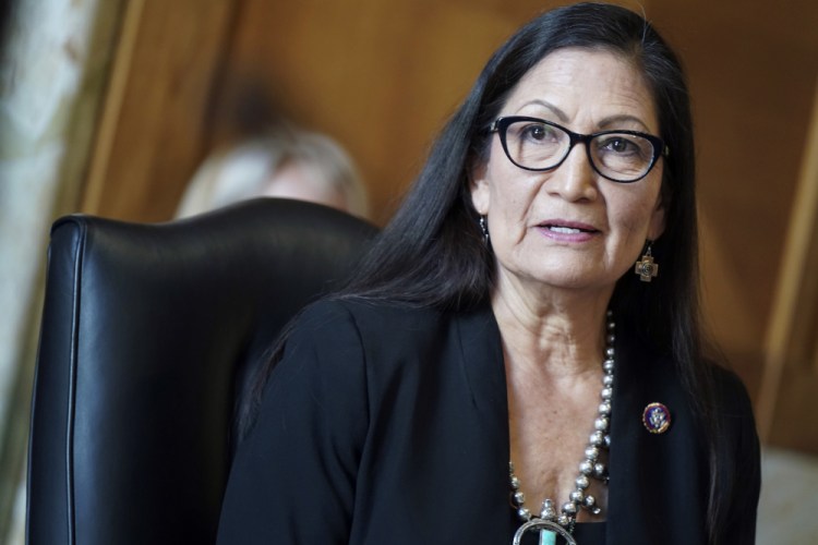 Rep. Debra Haaland, D-N.M., testifies before a Senate Committee on Energy and Natural Resources hearing on her nomination to be secretary of the Interior, on Capitol Hill in February. Haaland would become the first Native American to lead the Interior Department that oversees tribal land, national parks, endangered species, and oil and gas development on public lands. 