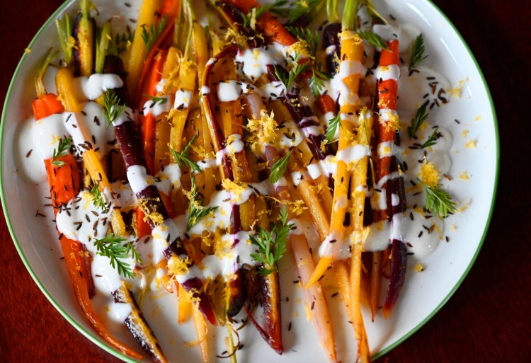 BRUNSWICK, ME - MARCH 25: Stovetop carrots with cumin and sweet lemon yogurt for Green Plate Special Thursday, March 25, 2021. (Staff Photo by Shawn Patrick Ouellette/Staff Photographer)