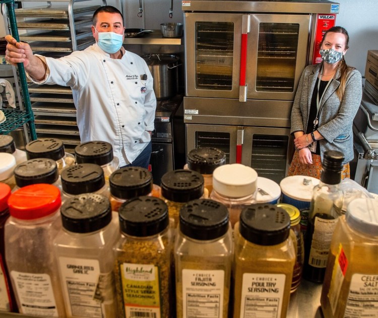 Michael Flynn, left, nutritional director for Regional School Unit 12, and Chelsea Elementary School Principal Allison Myers stand in the school's kitchen on March 30. RSU 12 is getting a grant to strengthen it's local food partnerships.