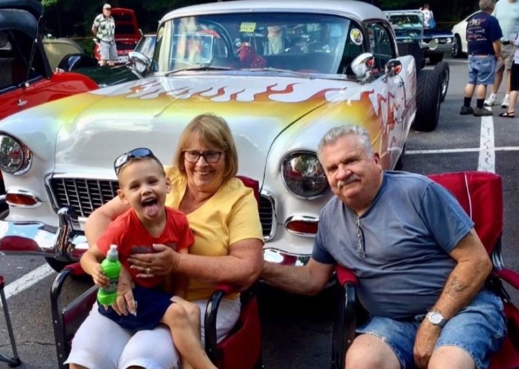 Barry Leighton, his wife and their grandson, Trevor.