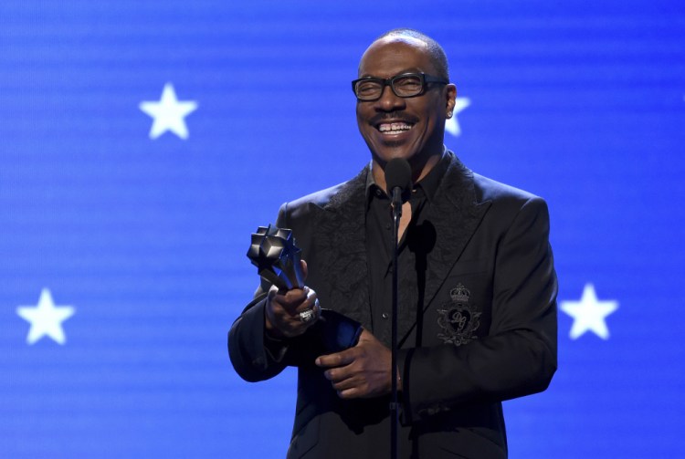 Eddie Murphy accepts the lifetime achievement award at the 25th annual Critics' Choice Awards on Jan. 12 in Santa Monica, Calif. 