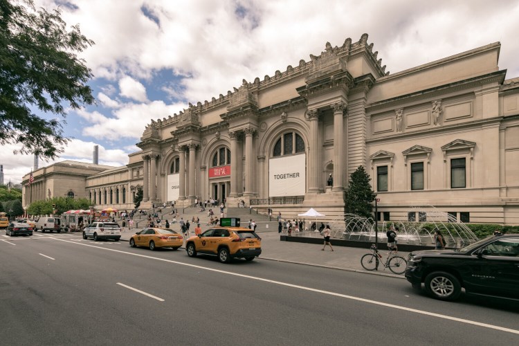 People sit on the steps during the public reopening at the Metropolitan Museum of Art in Manhattan, New York on Aug. 30, 2020. MUST CREDIT: Photo by Jeenah Moon for The Washington Post.