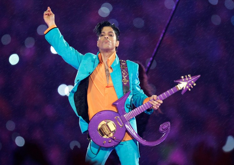 Prince performs during the halftime show at the Super Bowl XLI football game in Miami in 2007. Fans will visit Paisley Park today to mark five years since his death.