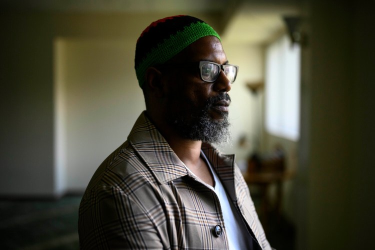 Karim Amin poses in the prayer room of his mosque, the Gwynn Oak Islamic Community, in Baltimore on April 11, 2021. MUST CREDIT: Photo for The Washington Post by Matt Roth