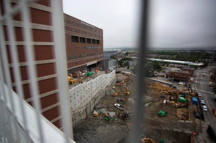 PORTLAND, ME - JUNE 15: Maine Medical Center (MMC) announced the largest single philanthropic gift in the hospital’s 150-year history Tuesday, a $25 million donation by John and Leslie Malone. In recognition of the gift, MMC will be naming its newest building, currently under construction on Congress Street, as the Malone Family Tower. **EMBARGOED UNTIL 7 PM (Staff photo by Derek Davis/Staff Photographer)