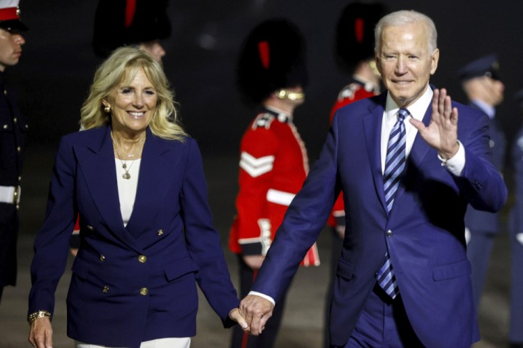 U.S. President Joe Biden and first lady Jill Biden arrive on Air Force One at Cornwall Airport Newquay, near Newquay, England, ahead of the G7 summit in Cornwall, early Thursday, June 10, 2021. 