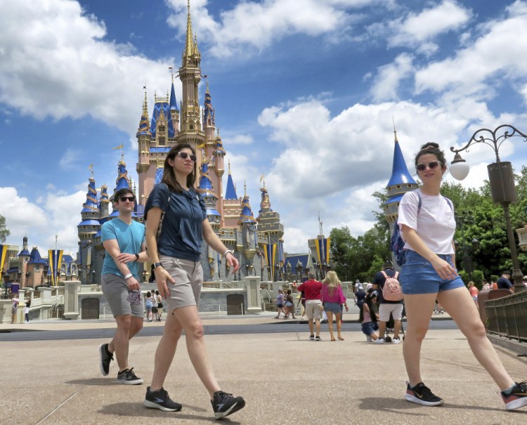 Young fans enjoy seeing Winnie The Pooh, and Tigger too, at the Magic Kingdom at Walt Disney World, in Lake Buena Vista, Fla., Monday, May 17.