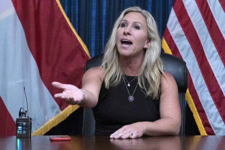 Rep. Marjorie Taylor Greene, R-Ga., talks to the media about her suspended accounts on Twitter, during a news conference, on Capitol Hill in Washington, Tuesday, July 20, 2021.