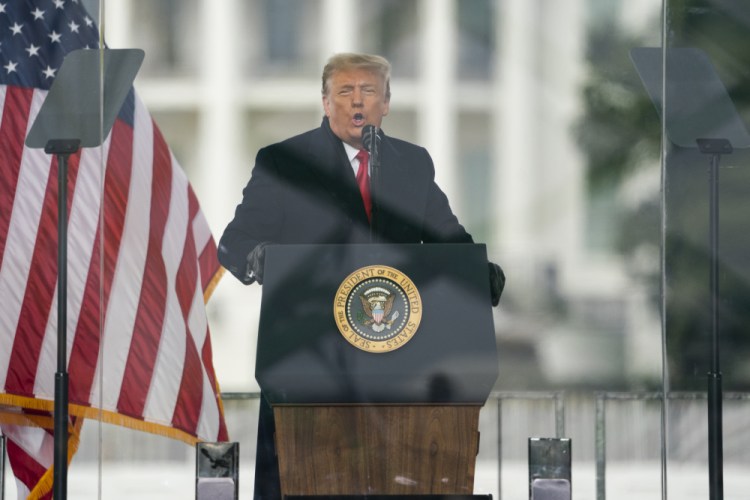 Then-President Donald Trump speaks during a rally protesting the electoral college certification of Joe Biden as President in Washington on Jan. 6. U.S. Capitol Police officers who were attacked and beaten during the Capitol riot filed a lawsuit Thursday, Aug. 26, against Trump, his allies and members of far-right extremist groups, accusing them of intentionally sending insurrectionists to disrupt the congressional certification.