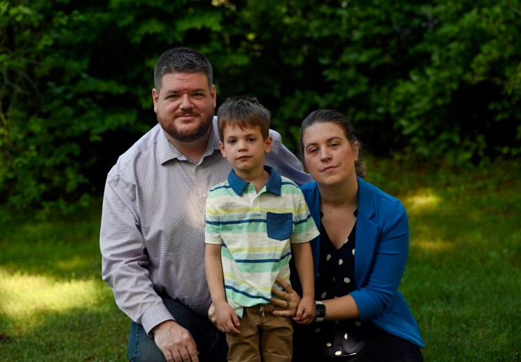 WESTBROOK, ME - SEPTEMBER 10: The Morse family,  David, David 5, and Kaitlyn of Westbrook Friday, September 10, 2021. David, 5, was supposed to start kindergarten at Canal Elementary School in Westbrook, but due to a COVID exposure at kindergarten orientation can't return to in-person school until Sept. 13. (Staff Photo by Shawn Patrick Ouellette/Staff Photographer)